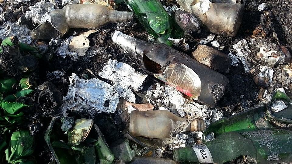 Visitors of Lalbagh have not only spotted huge piles of garbage being burnt, but also empty alcohol bottles.