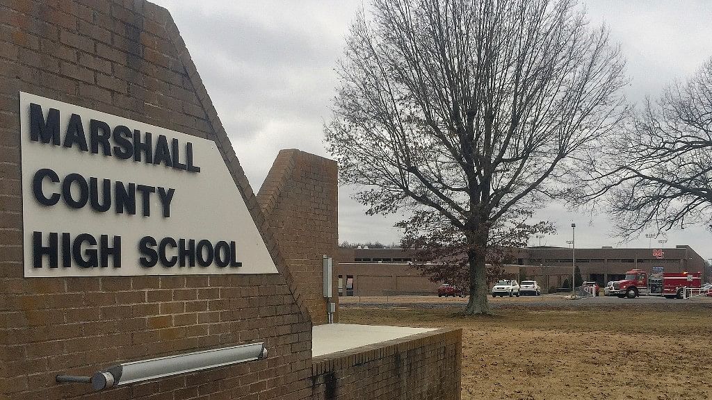 Authorities investigate the scene of a fatal school shooting in Tuesday in Kentucky.&nbsp;