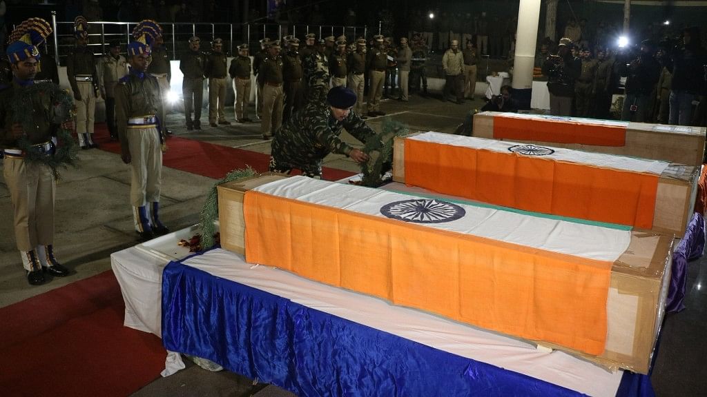  Soldiers lay wreath at the mortal remains of the four CRPF troopers killed in Jammu and Kashmir’s Pulwama district in Srinagar on 31 December.&nbsp;