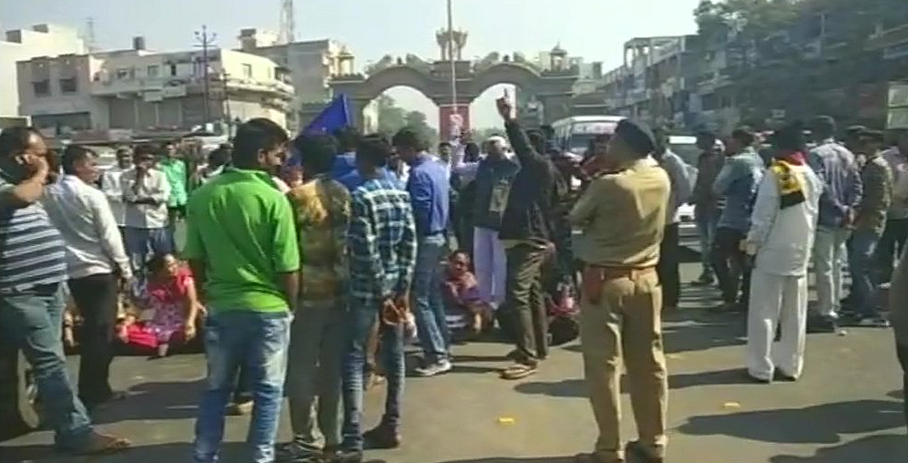 Protesters block Madhuram Bypass road in Junagadh