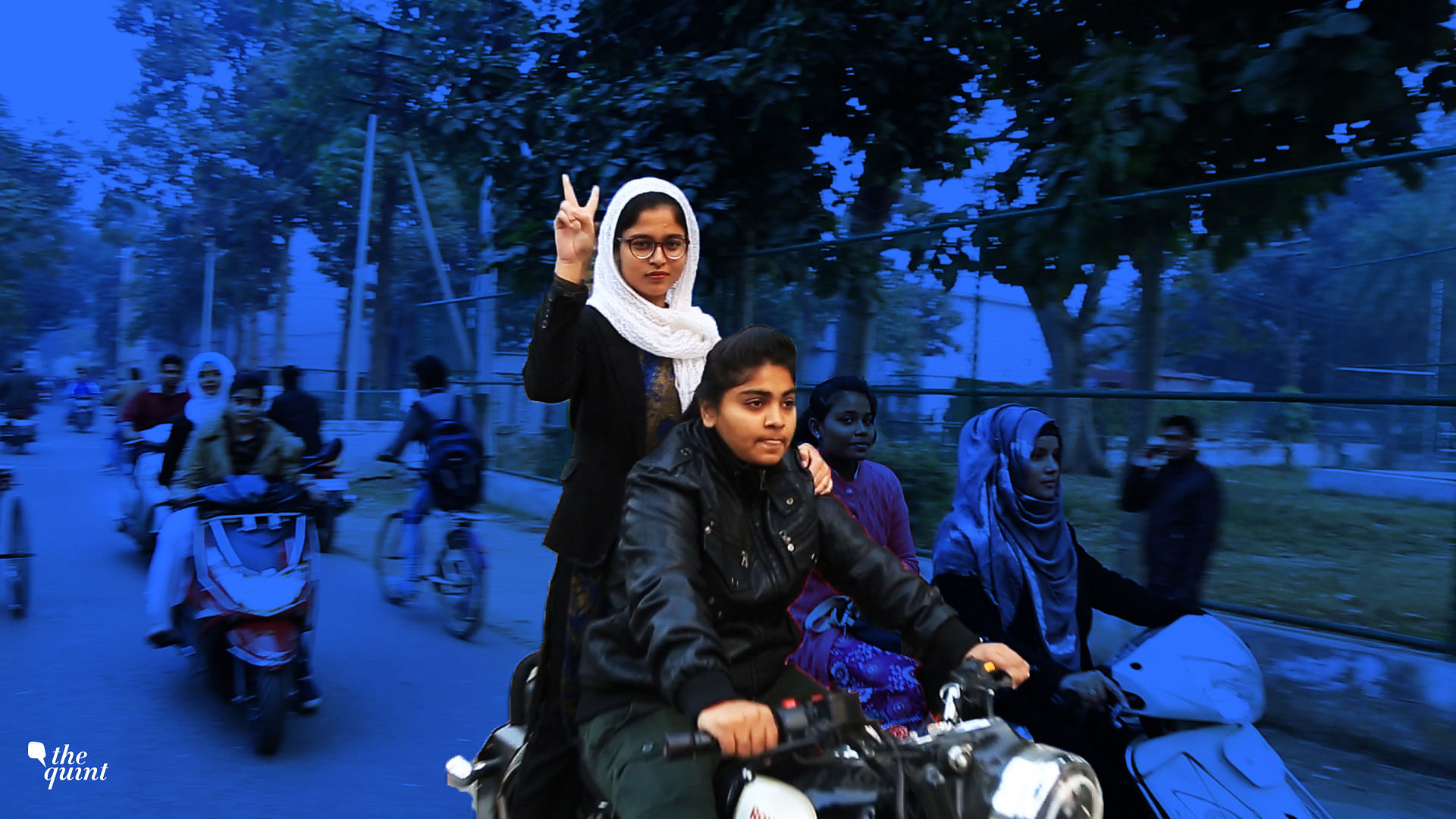 AMU Women’s College President Naba Naseem (in white dupatta) with biker Aiman&nbsp;