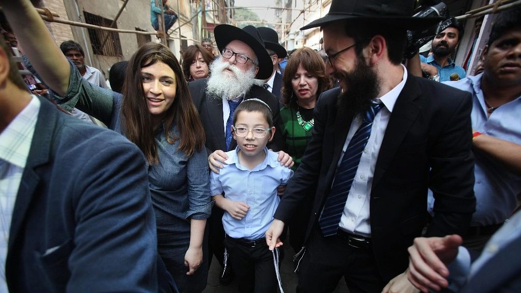 Israeli boy Moshe Holtzberg, who lost his parents during the 26/11 Mumbai terror attacks, arrives at Nariman House in Colaba, in Mumbai on Tuesday.&nbsp;