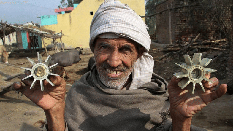 File photo of a villager displays a mortar shell allegedly fired on a residential area from the Pakistan side at the India-Pakistan international border at Pindi Camp in Arnia Sector about 40km from Jammu.