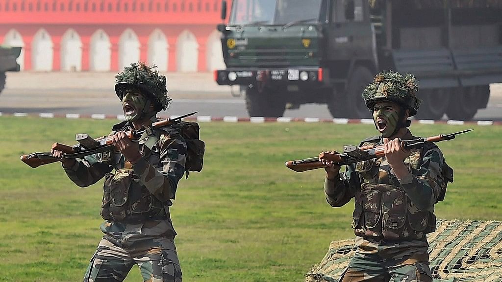 Army soldiers display their war skill during the Army Day Parade in New Delhi on Monday.&nbsp;
