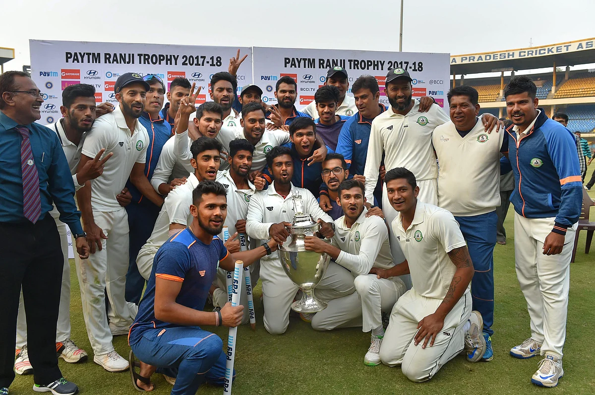 Vidarbha team with the coveted Ranji trophy.