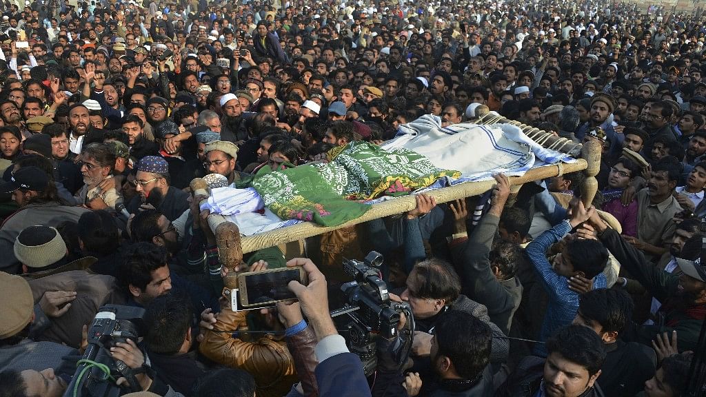 People attend a funeral of a Pakistani girl who was raped and killed, in Kasur, Pakistan, on 10 January. 