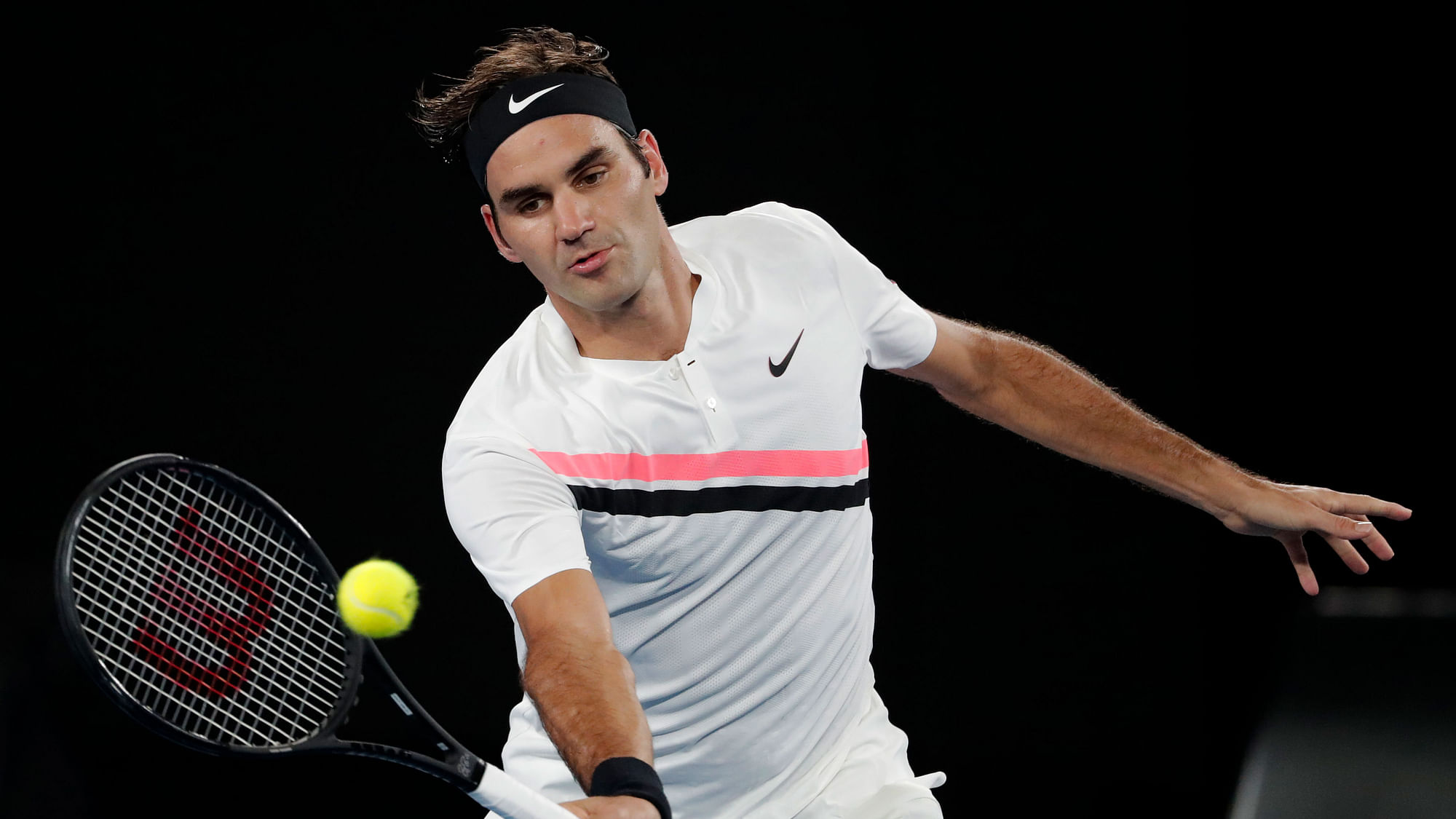 Switzerland’s Roger Federer makes a forehand return to France’s Richard Gasquet during their third round match.