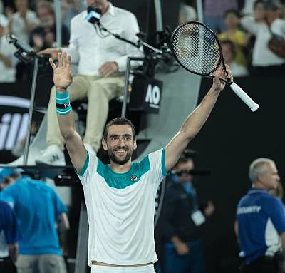 MELBOURNE, Jan. 25, 2018 (Xinhua) -- Marin Cilic of Croatia celebrates after winning the men