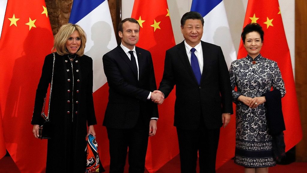 French President Emmanuel Macron with Chinese President Xi Jinping in Beijing. 