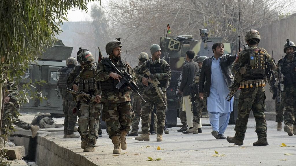 Security forces near the Save the Children office in Kabul on 24 January.