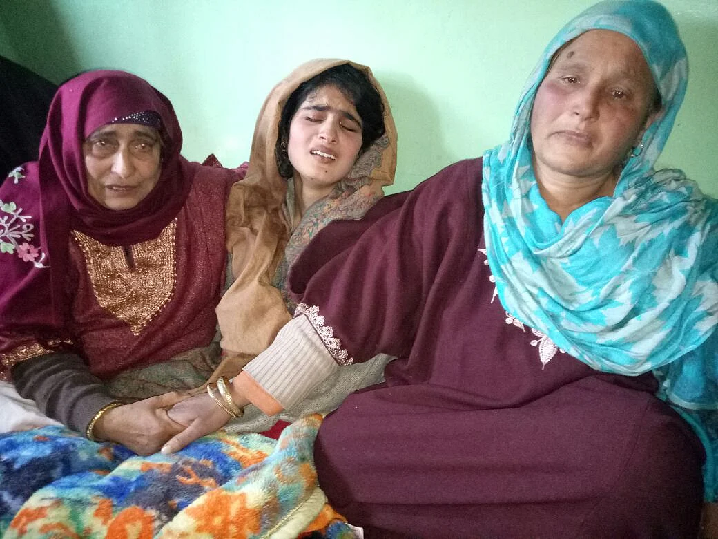 Mannan Wani’s mother (extreme right) has made an appeal to his son to return home.