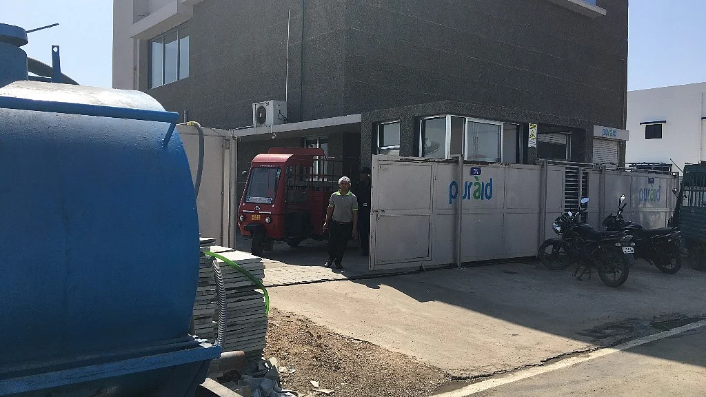 Although basic infrastructure is now available, water tankers are still being used by units such as this one in Sanand GIDC