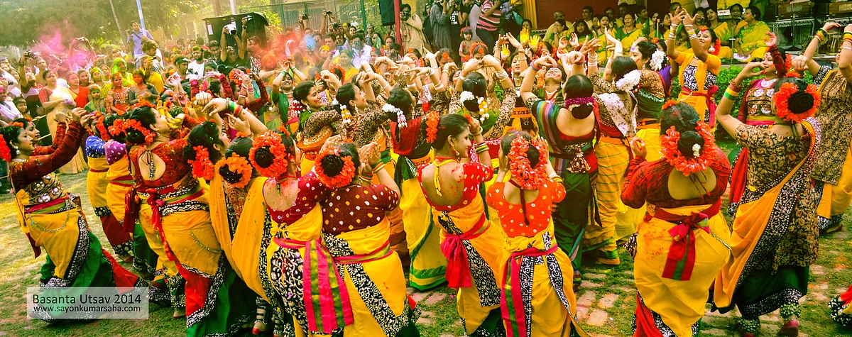 Students and professors dress up in yellow for the occasion of Basant Utsav in Santiniketan.