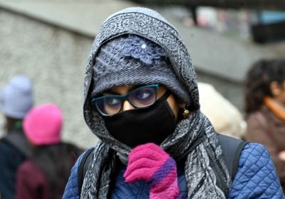 Woman wearing mask. (File Photo: IANS)