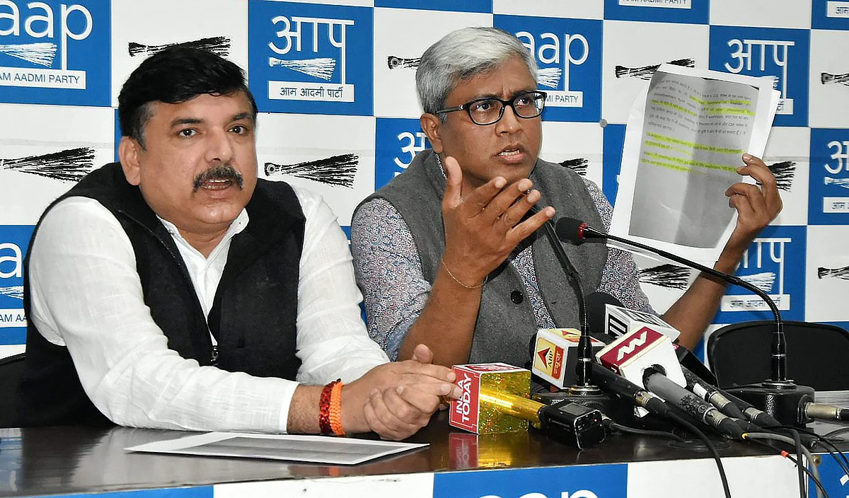 AAP Rajya Sabha MP Sanjay Singh with spokesperson Ashutosh address a press conference over the detainment of two AAP MLAs, in New Delhi on Thursday 22 February.