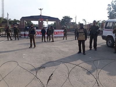 Jammu: Police personnel stand guard as a group of four-to-five heavily armed militants, who stormed an army camp in Jammu on Feb. 10, 2018. (Photo: IANS)