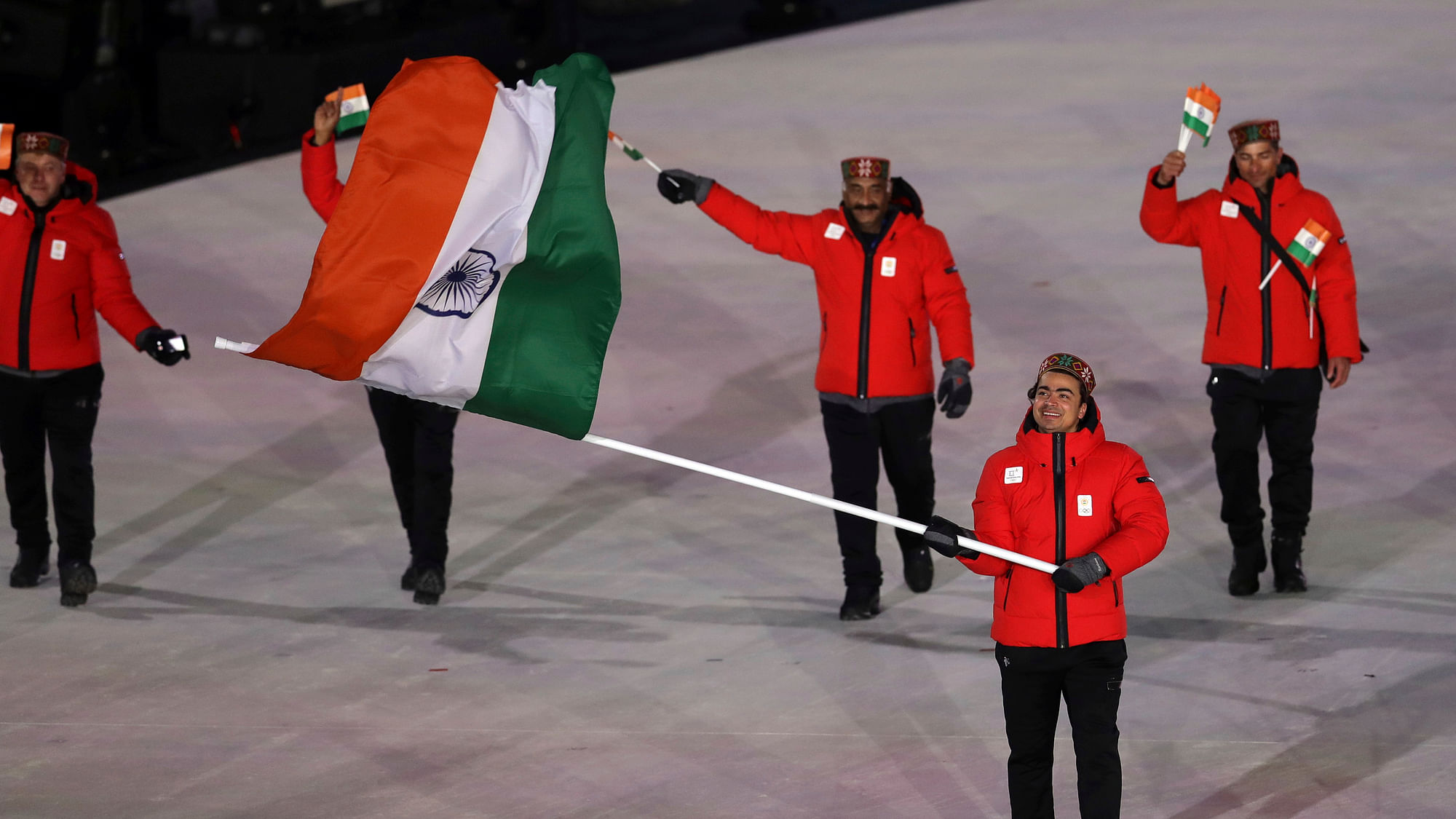 Shiva Keshavan carries the flag of India during the opening ceremony of the 2018 Winter Olympics in Pyeongchang in South Korea.