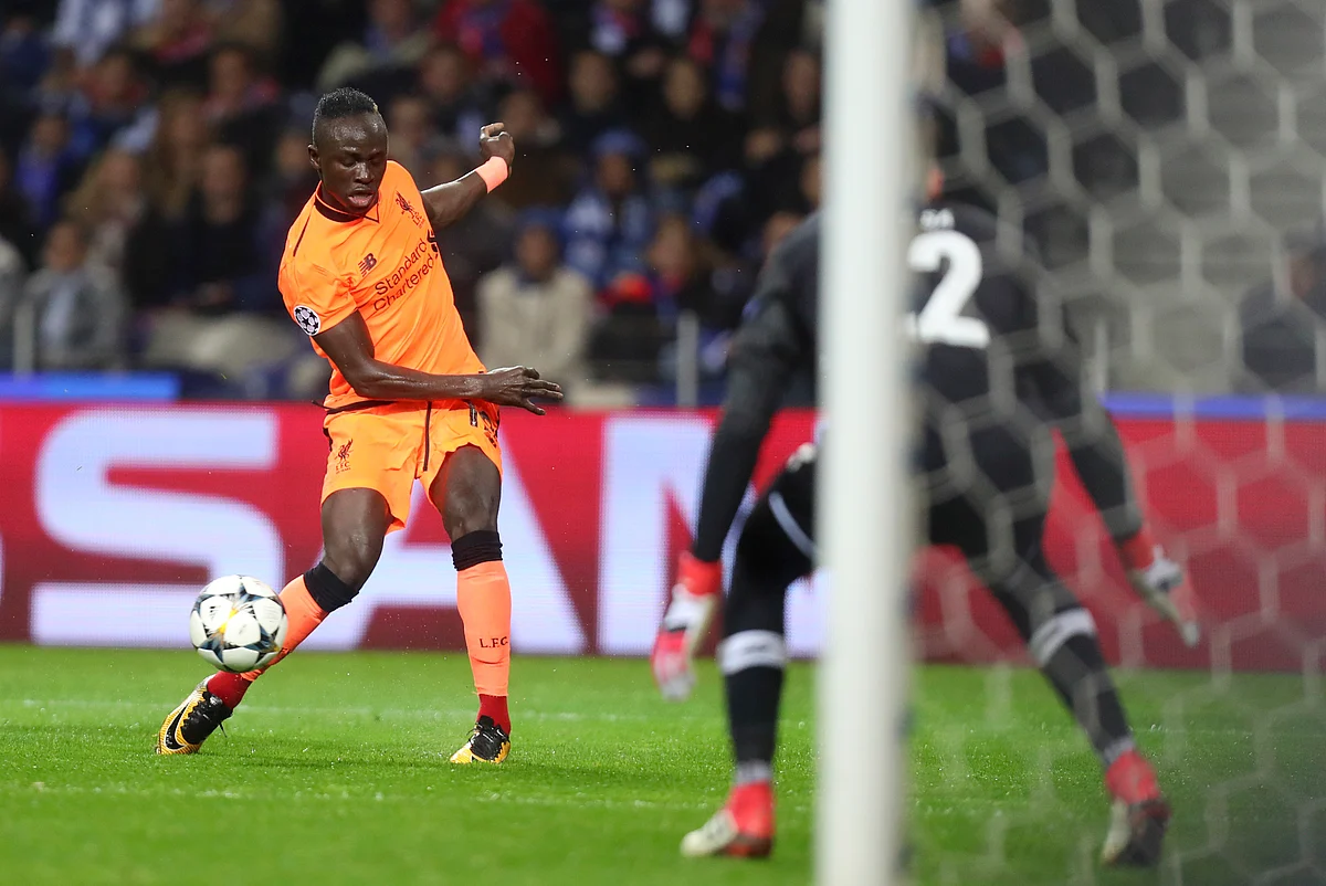 Liverpool’s Sadio Mane scores the opening goal during the Champions League round of sixteen first leg match between FC Porto and Liverpool FC at the Dragao stadium in Porto.