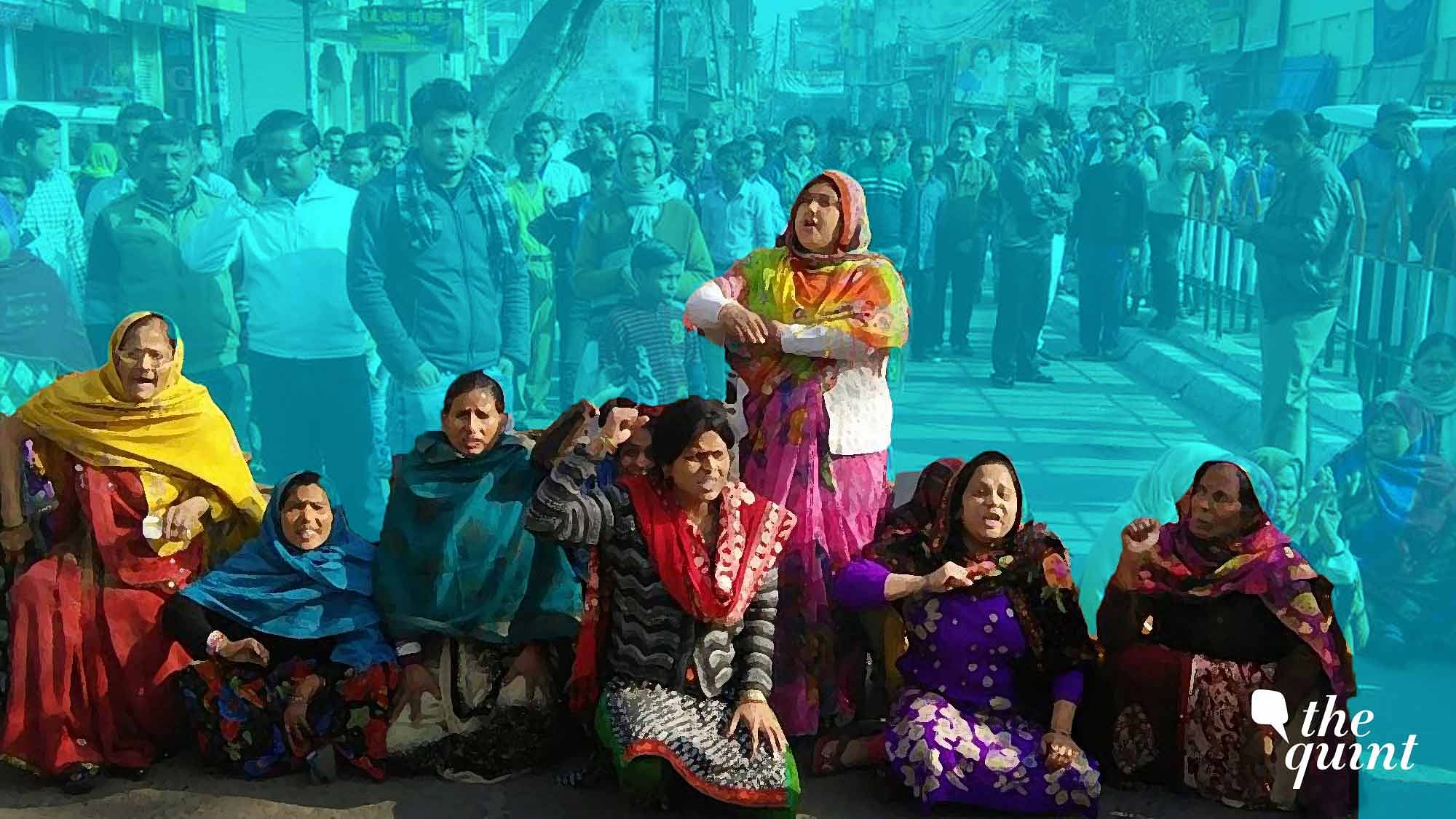 Kins of Chandan Gupta, along with local people, participate in a dharna in violence-hit Kasganj.