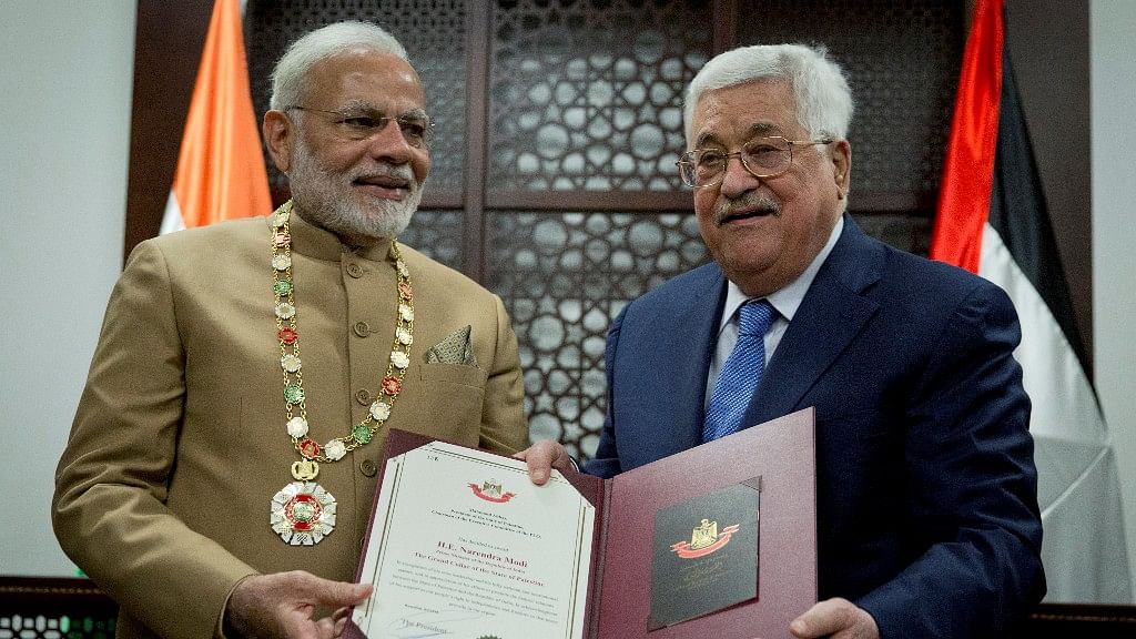 Palestinian President Mahmoud Abbas confers PM Narendra Modi with the ‘Grand Collar of the State of Palestine’, the highest Palestinian honour for foreign dignitaries.