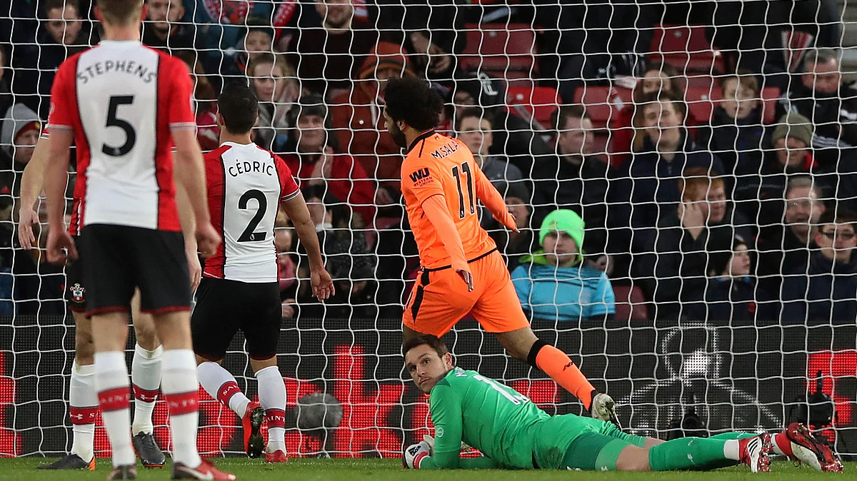 Liverpool’s Mohamed Salah scores against Southampton at St Mary’s Stadium in Southampton.
