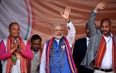 Phulbari: Prime Minister Narendra Modi waves at supporters during an election rally in Meghalaya