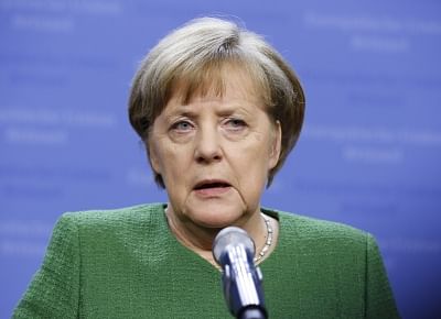 BRUSSELS, Feb. 23, 2018 (Xinhua) -- German Chancellor Angela Merkel addresses a press conference after a summit of the 27 EU leaders excluding British prime minister in Brussels, Belgium, on Feb. 23, 2018. Most European leaders were on the same page at an informal summit to claw back their says in picking the successor to Jean-Claude Juncker, incumbent president of the European Commission. (Xinhua/Ye Pingfan/IANS)