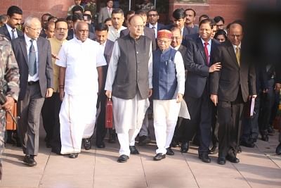New Delhi: Arun Jaitley, Union Minister of Finance with Pratap Shukla, MOS (Finance), Pon. Radhakrishnan, MOS (Finance), Dr. Hasmukh Adhia, Finance Secretary and other officials  at Finance Ministry before leaving for Parliament to present the Budget 2018-19 in Parliament on Feb. 1, 2018. (Photo: IANS)