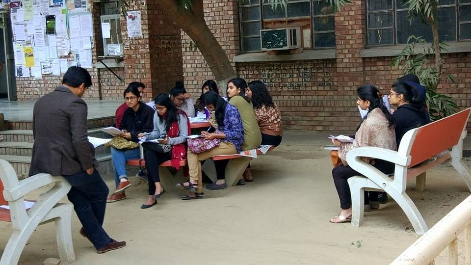 Classes in JNU being conducted outside the classroom after students decided to boycott classrooms in protest against compulsory attendance.