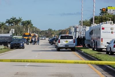 PARKLAND (U.S.), Feb. 15, 2018 (Xinhua) -- The site of a mass shooting near Marjory Stoneman Douglas High School is sealed off in Parkland, Broward County, Florida, the United States, on Feb. 15, 2018. 17 people were killed and over a dozen others were wounded after a 19-year-old gunman opened fire Wednesday at the high school, authorities said. (Xinhua/Monica McGivern/IANS)