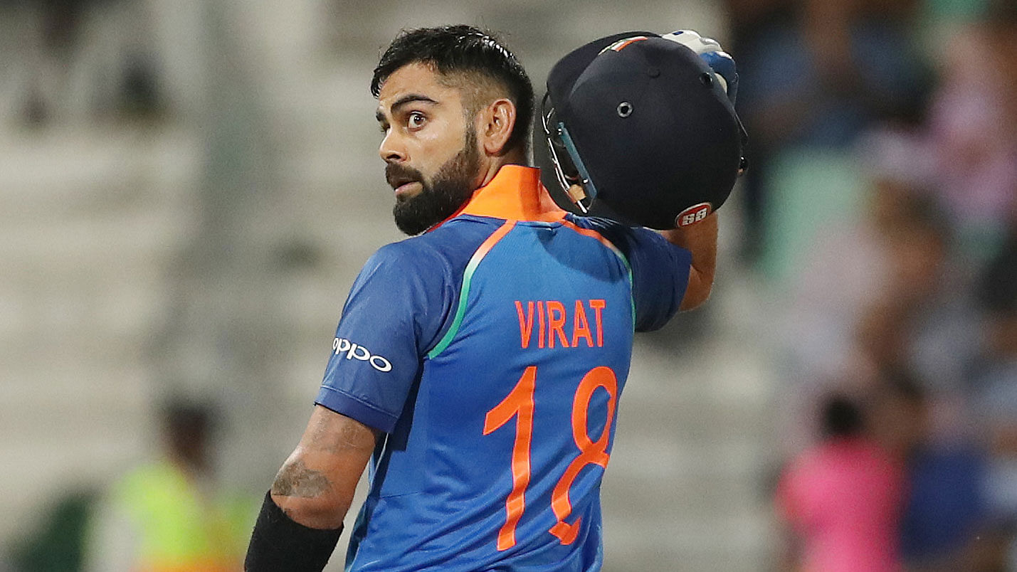 Virat Kohli celebrates after scoring a century against South Africa in the first ODI in Durban.