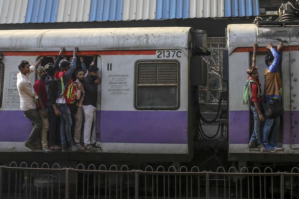 About ten commuters fall to death or are run over while crossing the tracks every day in Mumbai.
