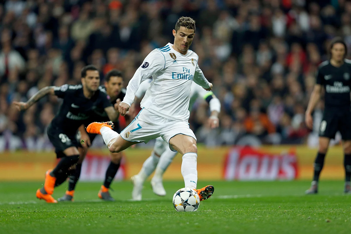 Real Madrid’s Cristiano Ronaldo scores his side’s first goal from the penalty spot during their Champions League Round of 16 first leg match against Paris Saint Germain at the Santiago Bernabeu stadium in Madrid