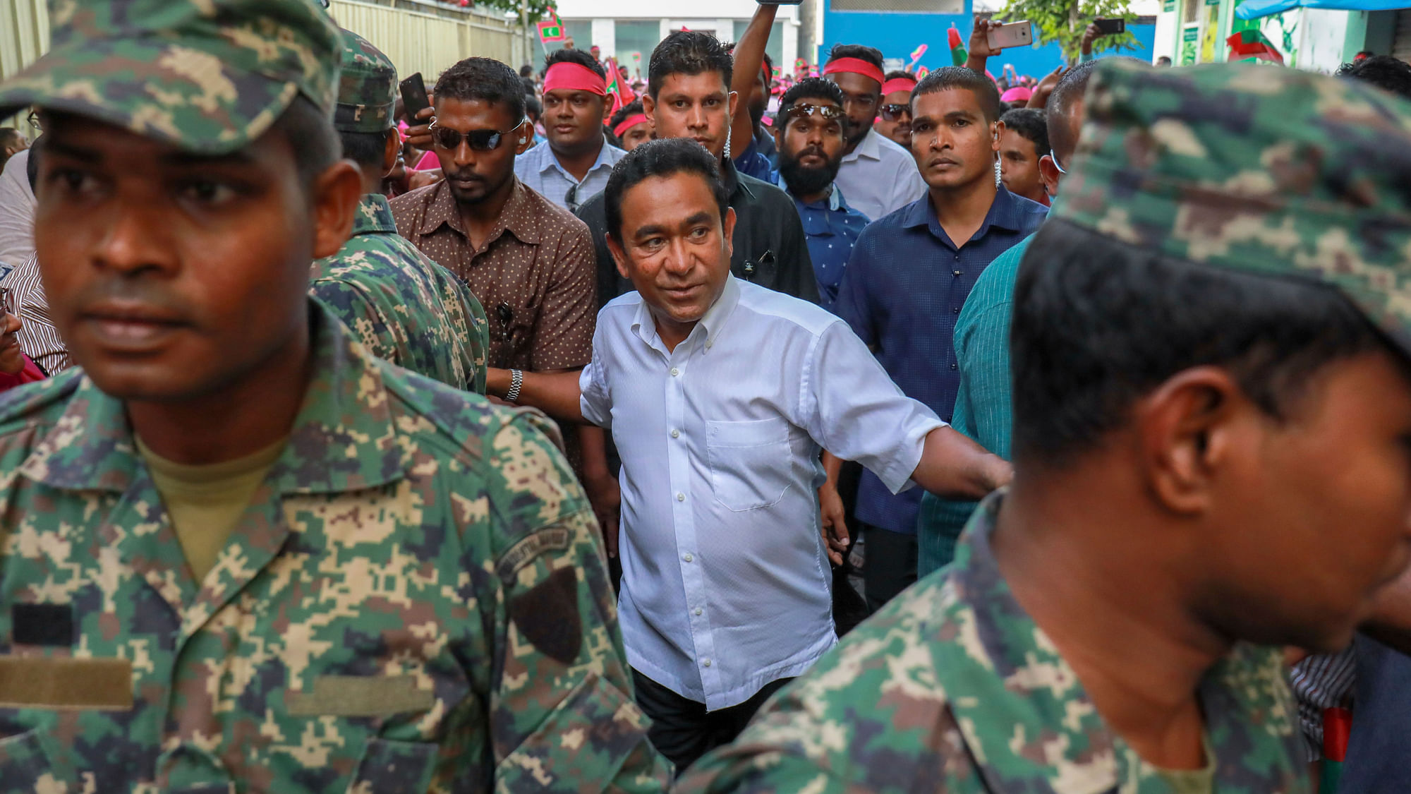 Maldivian President Abdulla Yameen, centre, surrounded by his bodyguards in Male, Maldives.&nbsp;
