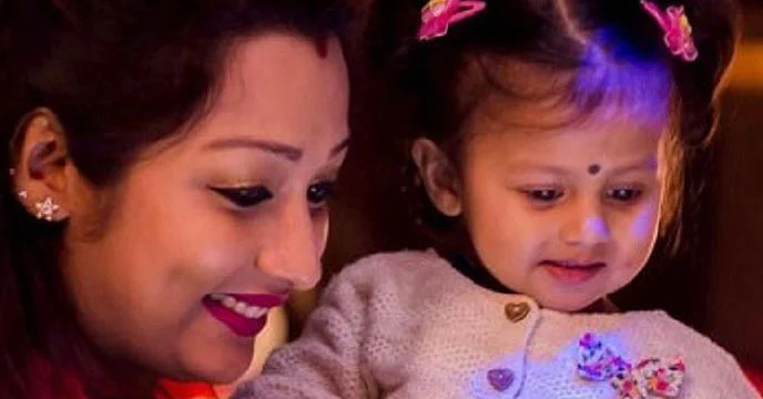Shampa Paul Dey with Oyetri on her first birthday.