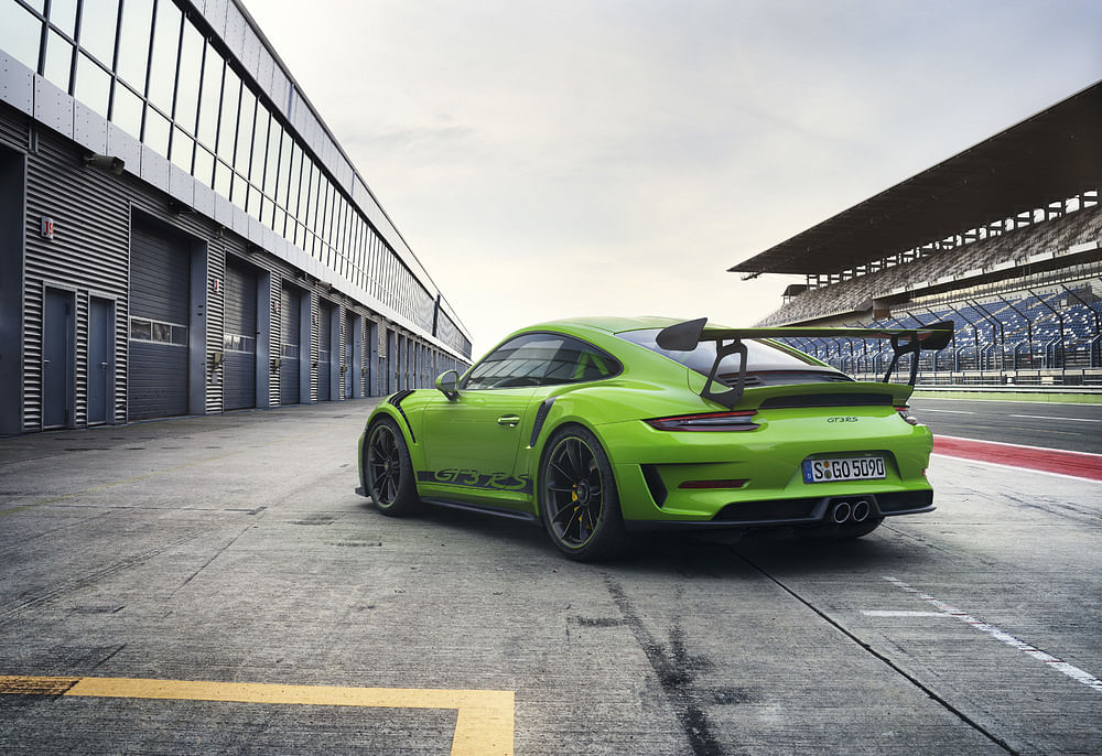 For Rs 44 lakh more than the standard car, the Porsche 911 GT3 RS packs in track-ready hardware and power.