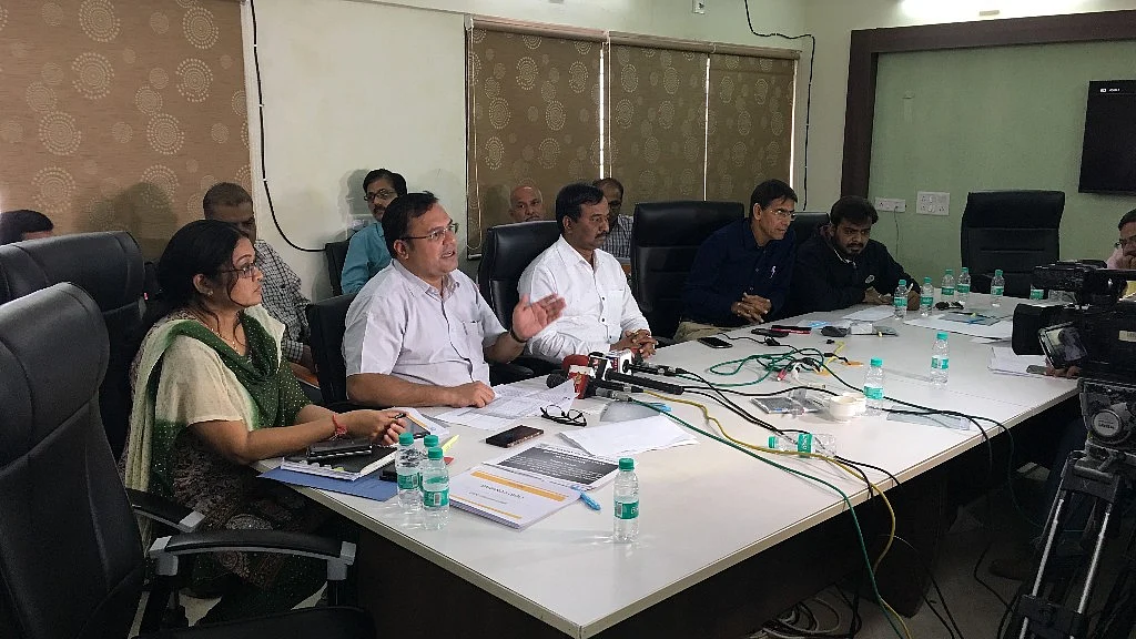 (Centre) Chintan Akhani, Divisional Manager, Ahmedabad, GIDC addresses the media on Friday, 9 February at Sanand GIDC office