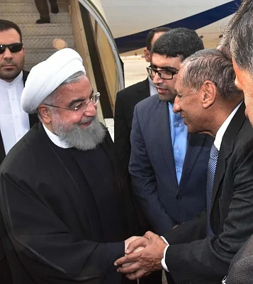 Hyderabad: Iranian President Hassan Rouhani being recived by Telangana Governor E.S.L. Narasimhan at Begumpet Airport in Hyderabad on Feb 15, 2018. (Photo: IANS)