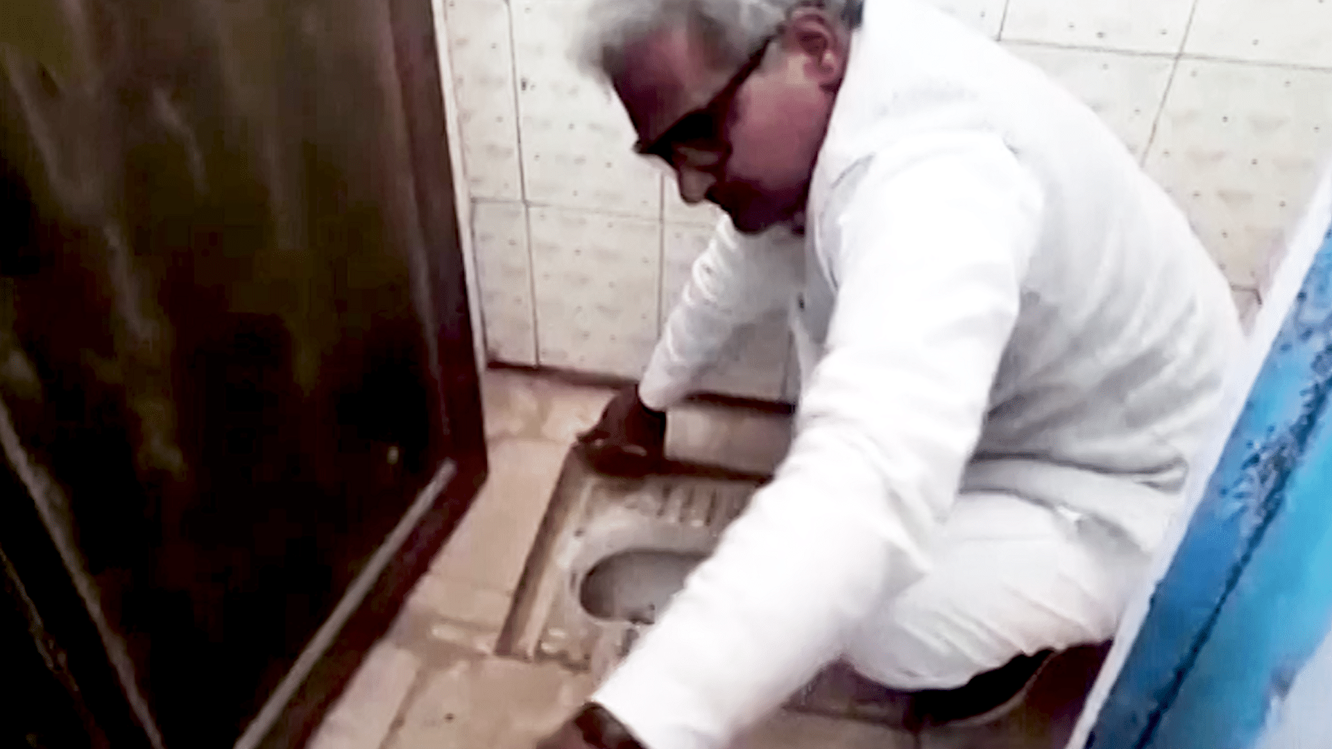 BJP MP  Janardan Mishra cleans school toilet.