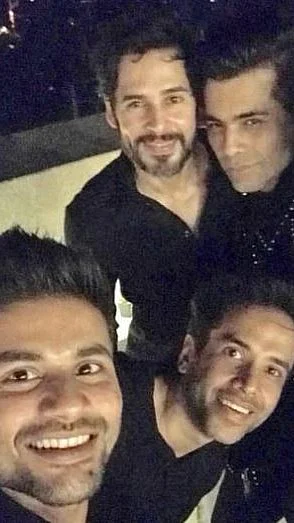 Karan Johar, Dino Morea and Tusshar Kapoor rocked the night in black. 