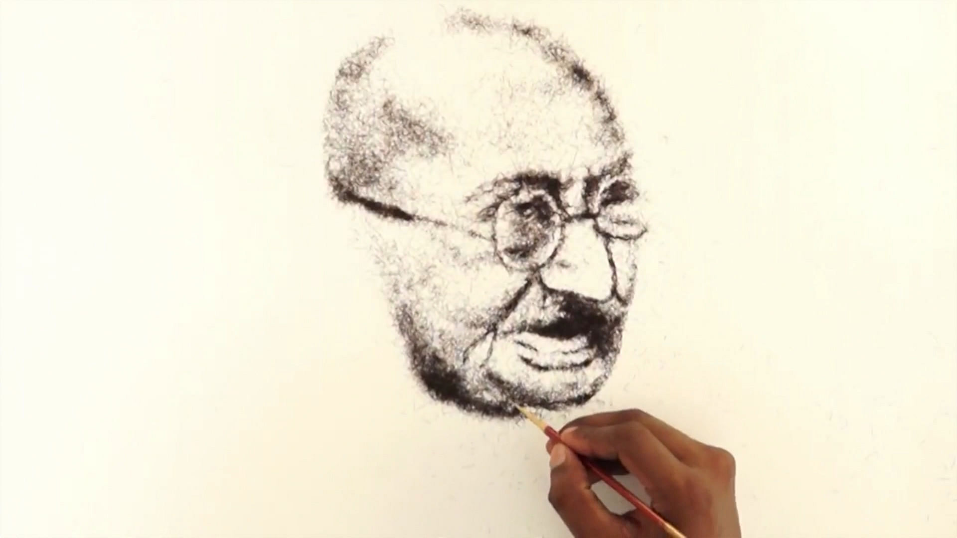 Indian artist Midhun R.R. creates portraits using strands of hair