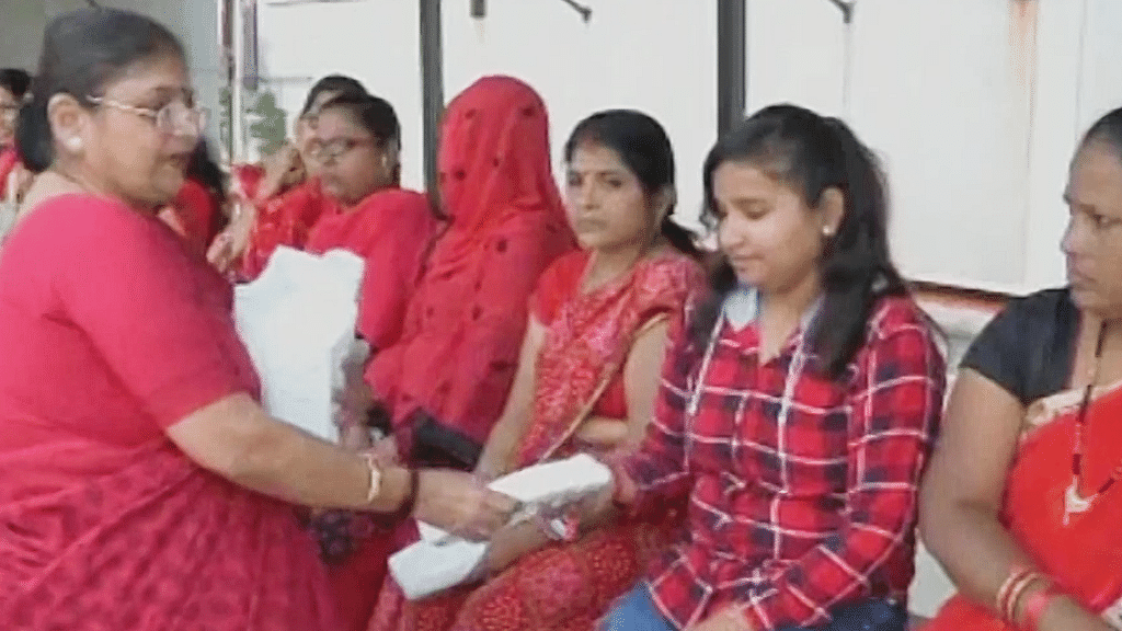 Couple from Surat distributes free sanitary pads to women.