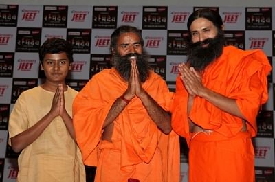 New Delhi: Yoga Guru Baba Ramdev with actor Kranti Prakash Jha and child artiste Naman Jain during a press conference on the launch of a biopic series