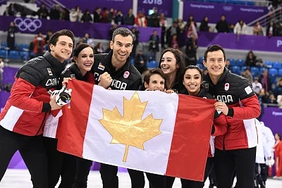 PYEONGCHANG, Feb. 12, 2018 (Xinhua) -- Team Canada celebrate after winning the figure skating team event at the 2018 PyeongChang Winter Olympic Games, in Gangneung Ice Arena, South Korea, on Feb. 12, 2018. Canada won the gold medal with 73 points in total. (Xinhua/Wang Song/IANS)