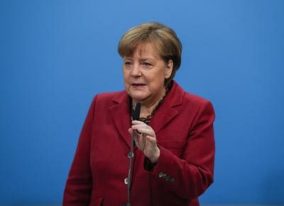 BERLIN, Jan. 26, 2018 (Xinhua) -- German Chancellor and leader of German Christian Democratic Union (CDU) Angela Merkel delivers a speech before the start of coalition talks at the CDU headquarters in Berlin, capital of Germany, on Jan. 26, 2018. (Xinhua/Shan Yuqi/IANS)