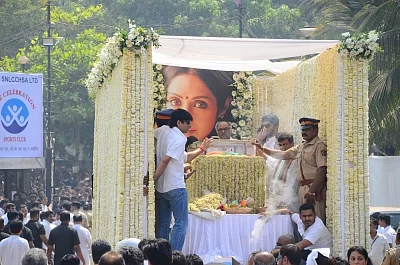 Mumbai: Producer Boney Kapoor accompany the body of late actress Sridevi to the Vile Parle Seva Samaj Crematorium and Hindu Cemetery for cremation in Mumbai on Feb 28, 2018. (Photo: IANS)