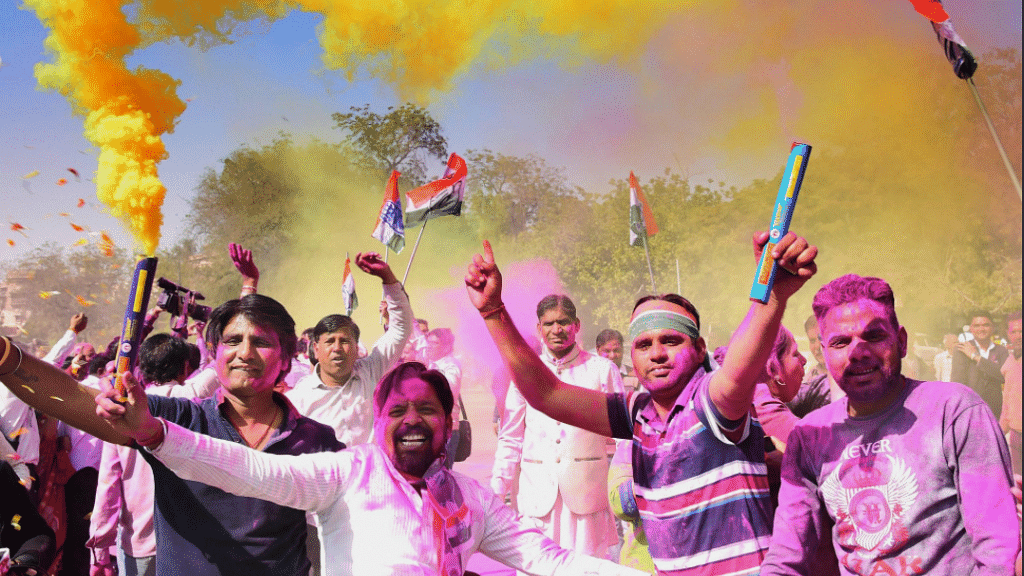 Congress workers celebrate in Rajasthan.