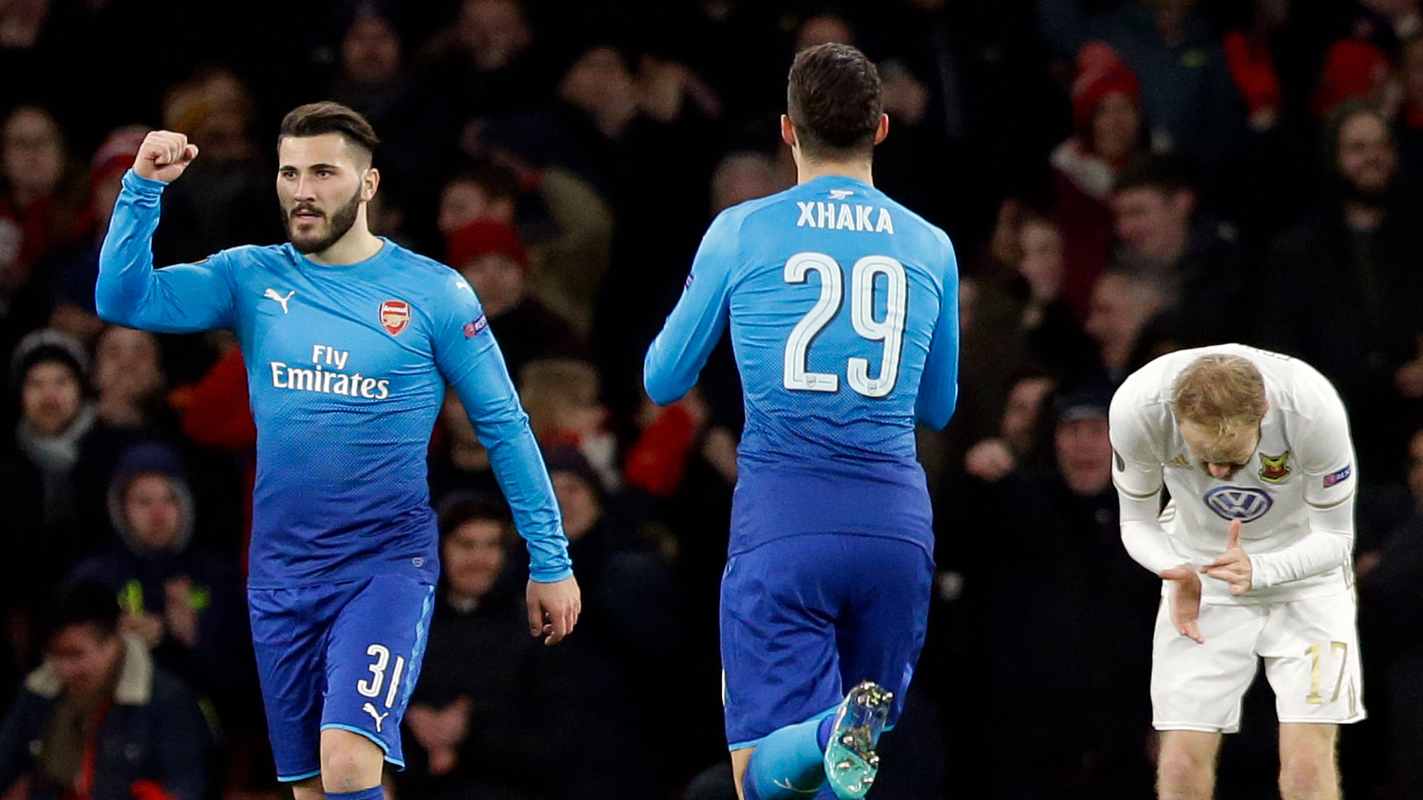 Arsenal’s Sead Kolasinac, right, celebrates after scoring his side’s first goal.