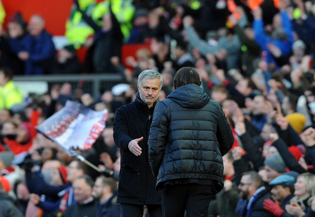 Manchester United’s manager Jose Mourinho (left) shakes hands with Chelsea’s team manager Antonio Conte at the end of the match. 