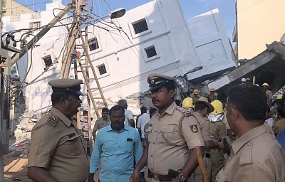 Bengaluru: Rescue operation underway after a four-storey building under construction collapsed on Jail Road at Kasavanahalli in Bengaluru on Feb 15, 2018. Reportedly three labourers were died and seven injured. (Photo: IANS)